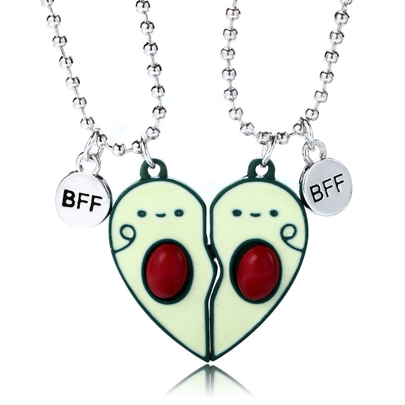 A Pair Of Avocado Necklaces Attract Magnets