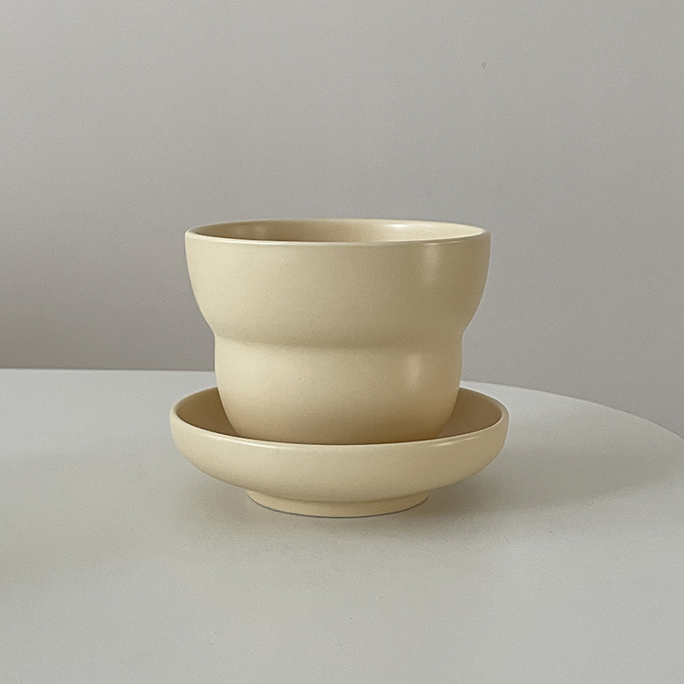 Beige gourd cup and saucer