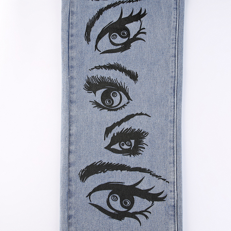 Title 7, Jeans azuis com estampa de olhos de personalida...