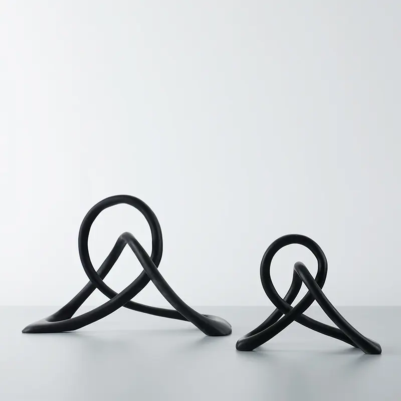 Simple and Modern Black Resin Twisted Knot Abstract Geometric