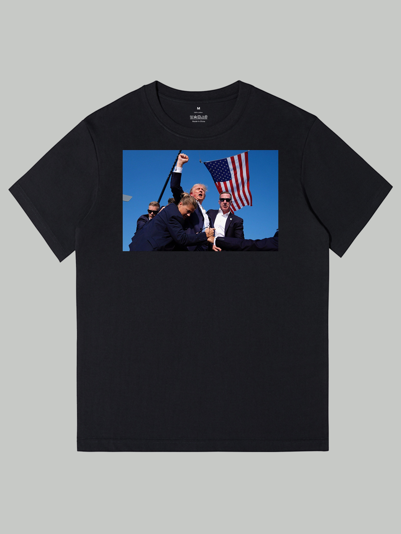 Trump 2024 Streetwear Cotton TShirt. 100% Combed Ring-Spun Cotton Heavy-duty 6 Oz. fabric for maximum durability Pre-shrunk to ensure a perfect fit Taped neck & shoulders for added comfort Seamless non-topstitched 7/8