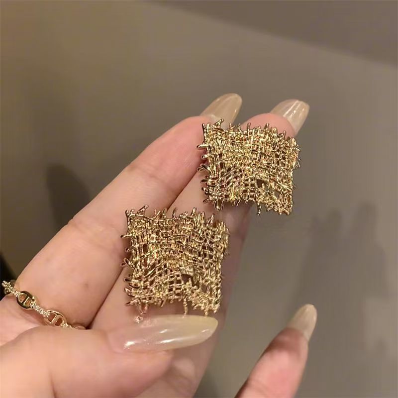 Gold Square Earrings With Geometric Hollow Mesh Design. Unique Niche Style, Bold European Aesthetic And Subtle Luxury.