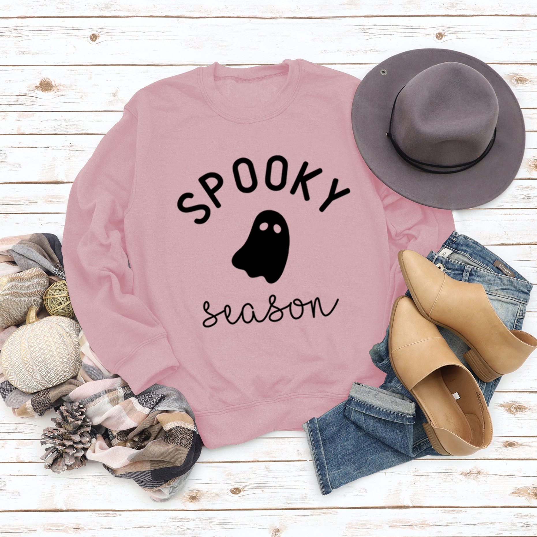 Pink sweater black font