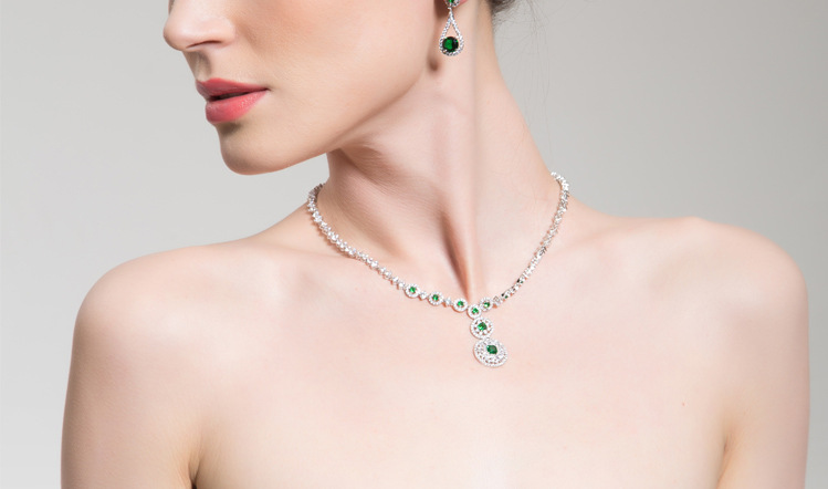 Green As Blue Small Round Earrings With Hearts And Arrows