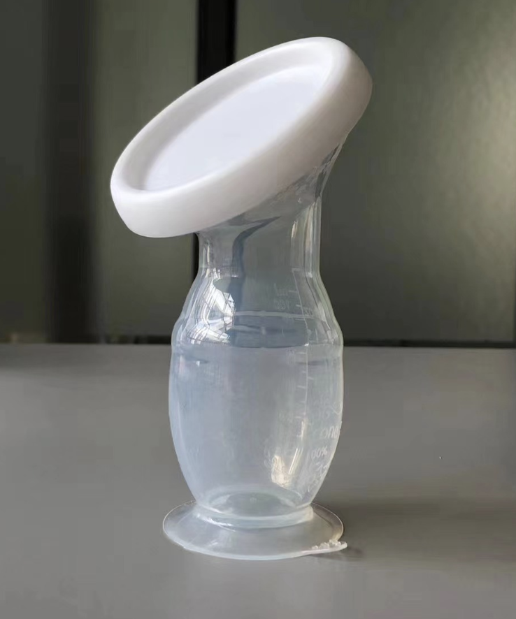 Silicone breast pump with lid