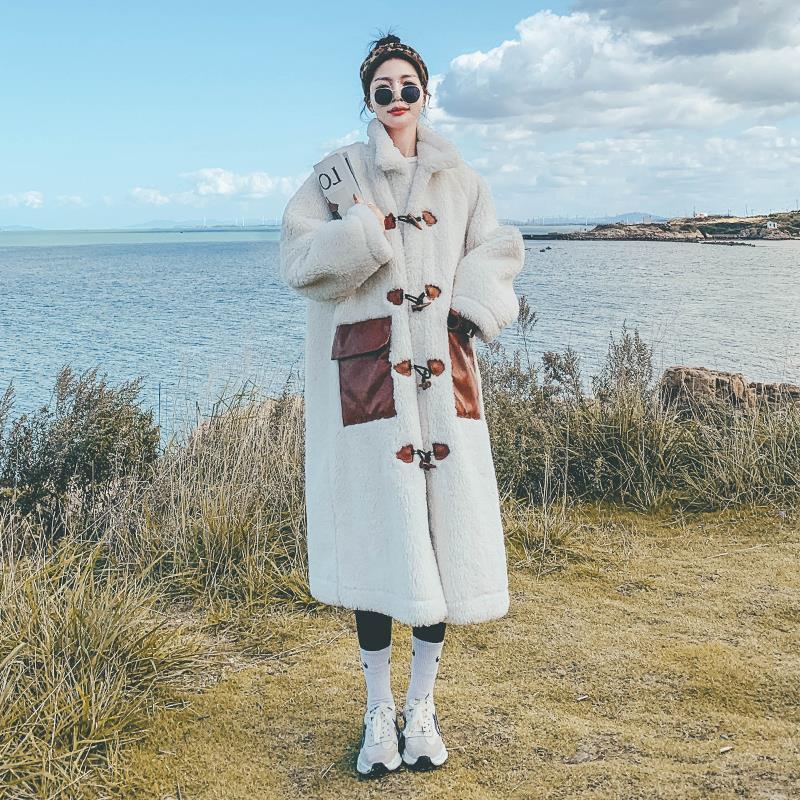 Title 4, Small long fur lambswool coat offering warmth a...