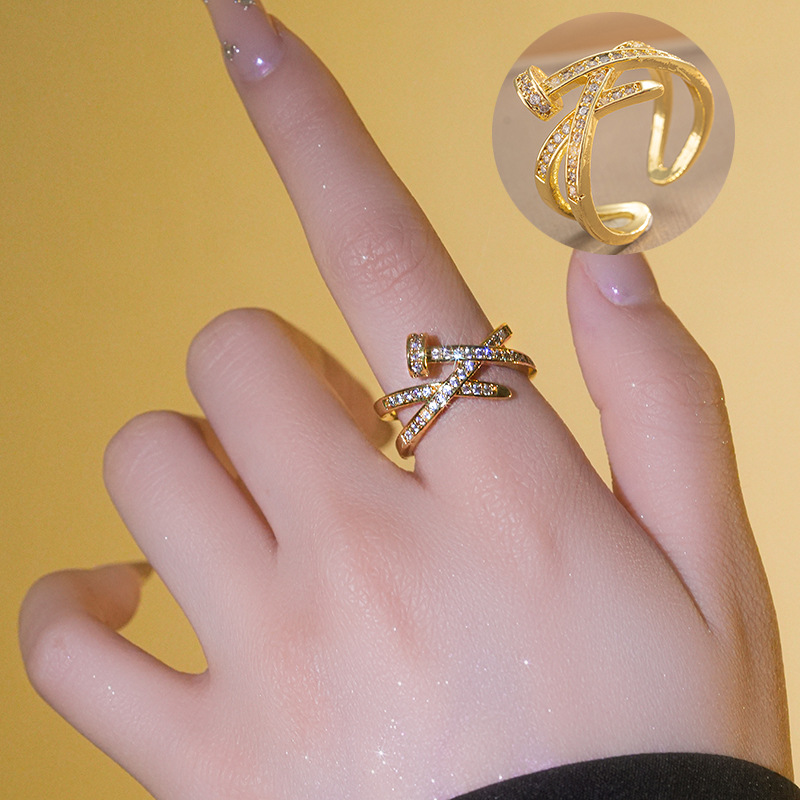 A Diamond Studded Zircon Nail Layered Open Ring