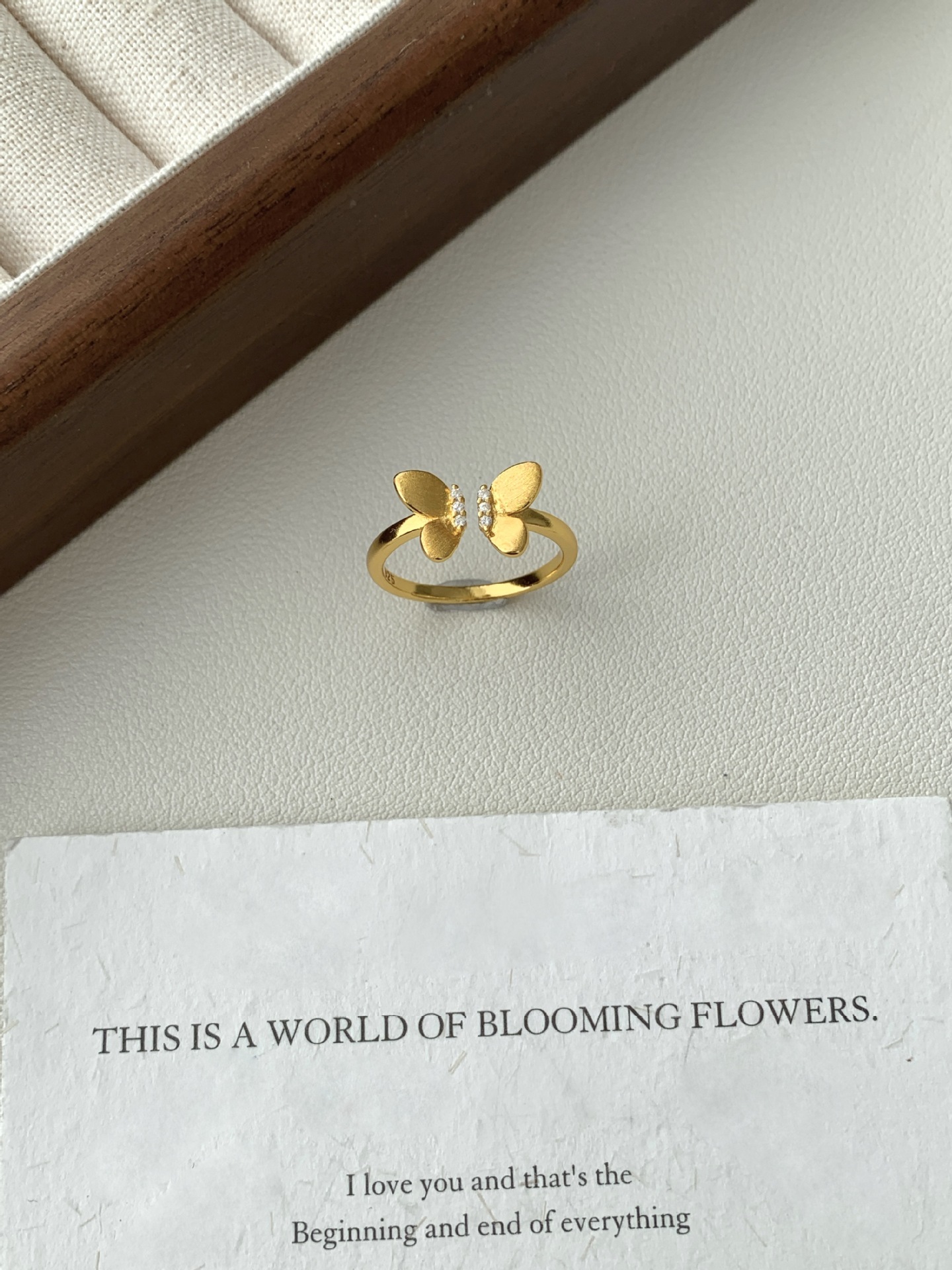 A Sophisticated Butterfly Ring With A Ribbon And Diamond Detailing. thumbnail 3