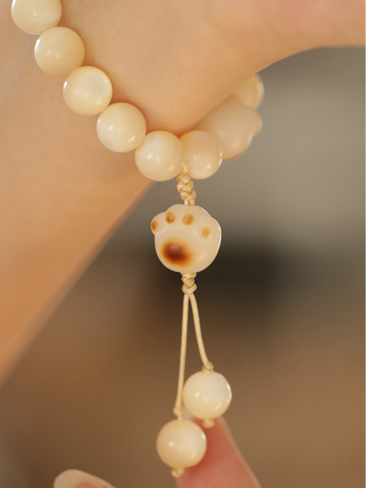 Finger Twirling And Soft Playing With Lovers' Bracelet