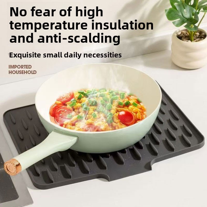 Silicone heat-resistant mat — the surface the ritual sits on