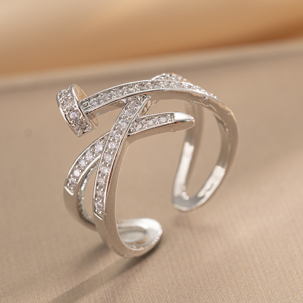A Diamond Studded Zircon Nail Layered Open Ring