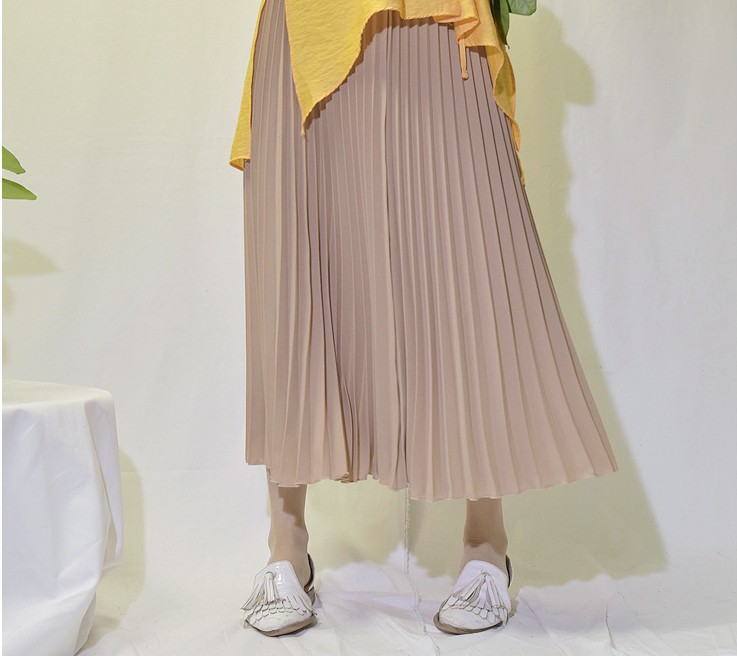 Title 9, Solid color pleated skirt offers effortless sty...