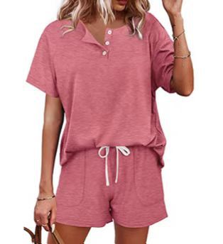 Solid color T-shirt shorts set, lifestyle detail shot showing fabric quality and co-ord styling