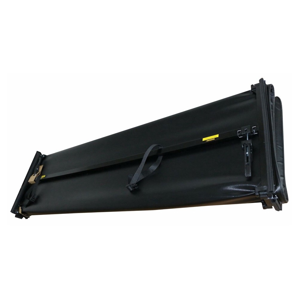 Mankee soft tonneau cover for Ford F-150 04-08 shown fully folded near cab for full bed access