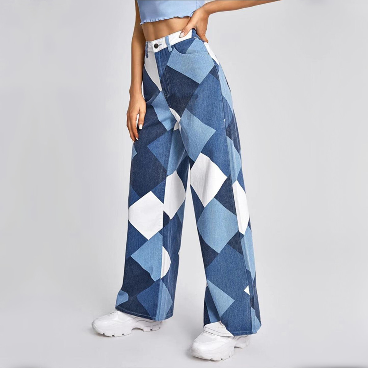 Title 6, Printed denim trousers with a high waist and wi...