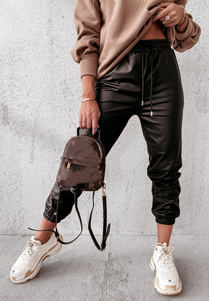 Women Solid Color Strapped Casual Leather Pants