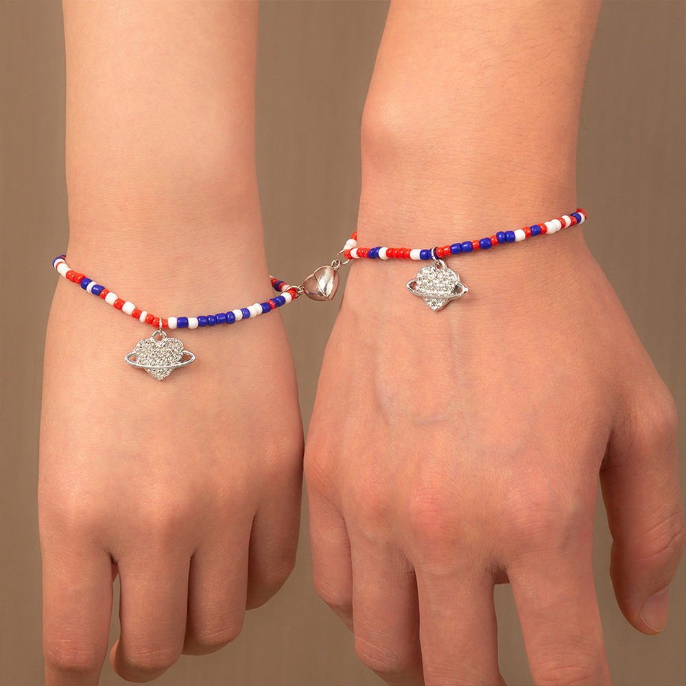 Title 6, Magnetische partnerarmbanden met intrekbare fun...