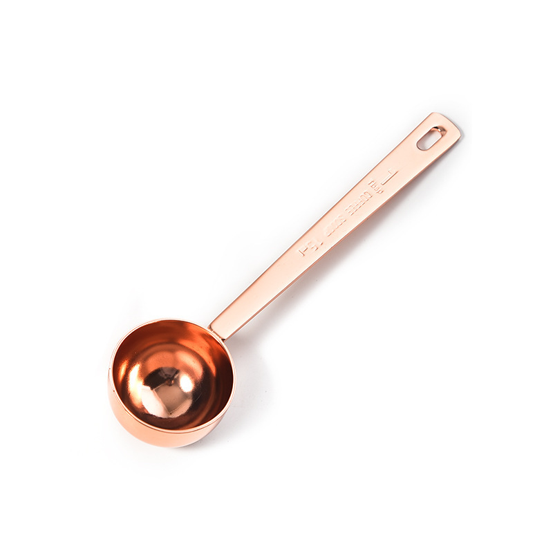 Rose gold measuring spoon