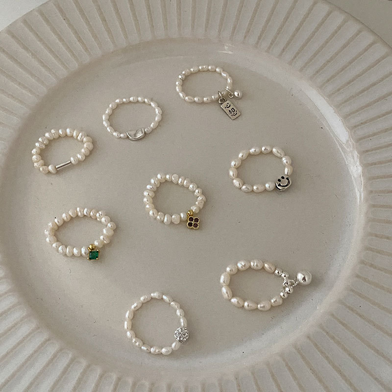 Variety Of Combination Silver Beads Index Finger