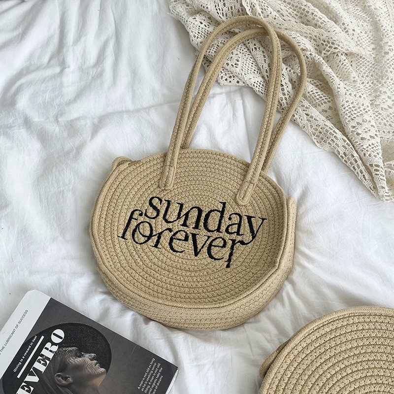 Round letter woven bag