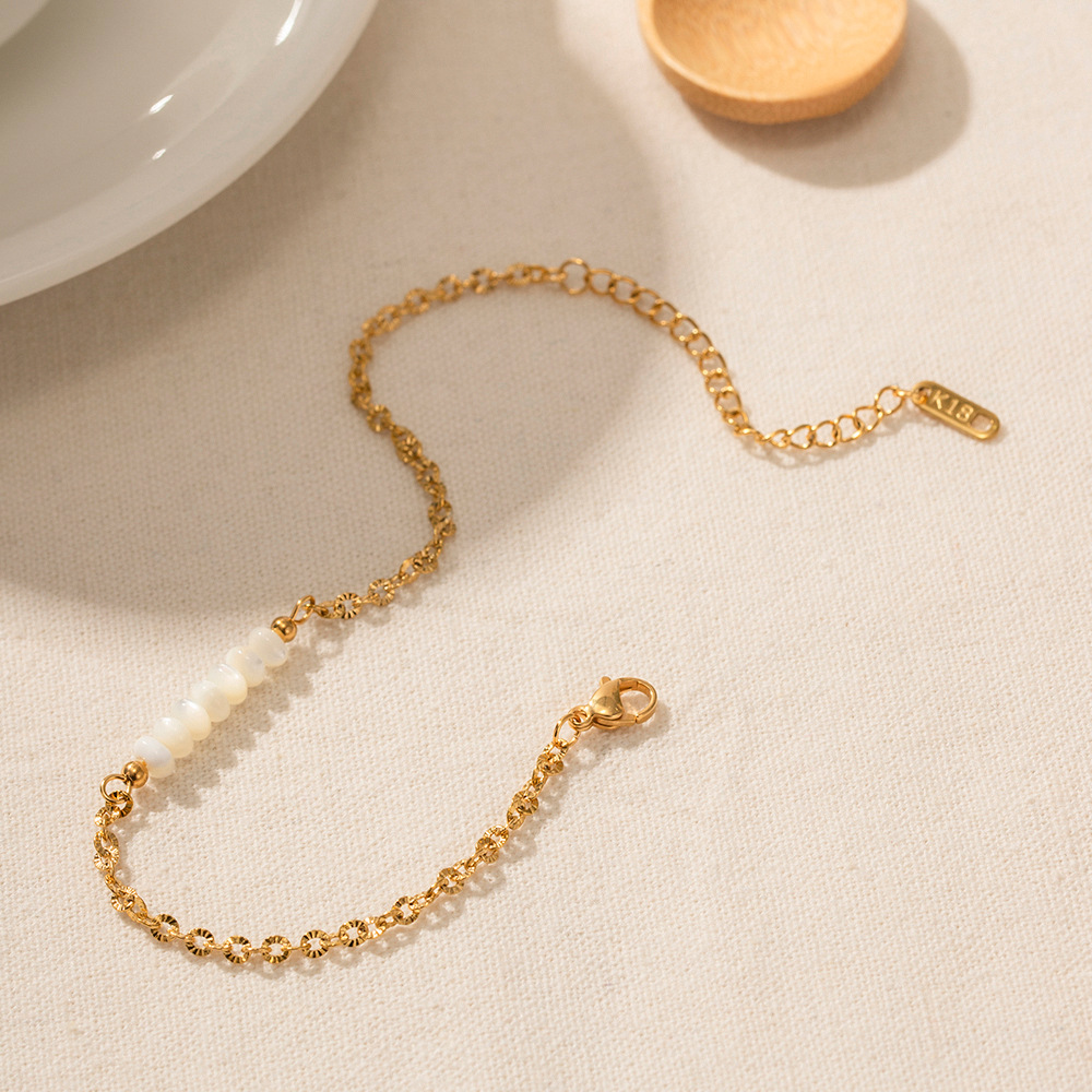 Title 7, 18K Gold Stainless Steel Chain Circular Shell