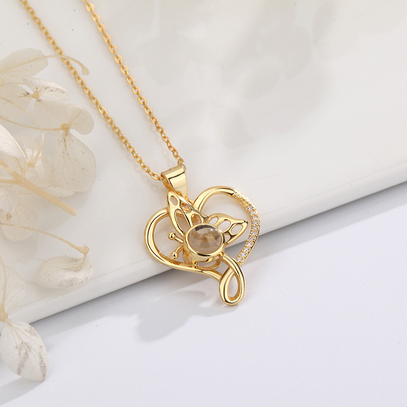 Women's Fashion Simple Silver Hollow Butterfly Love Projection Necklace