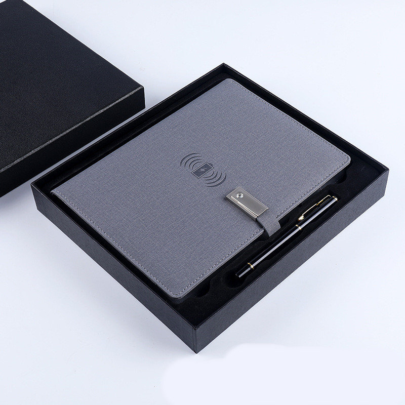 Light gray gift box with pen