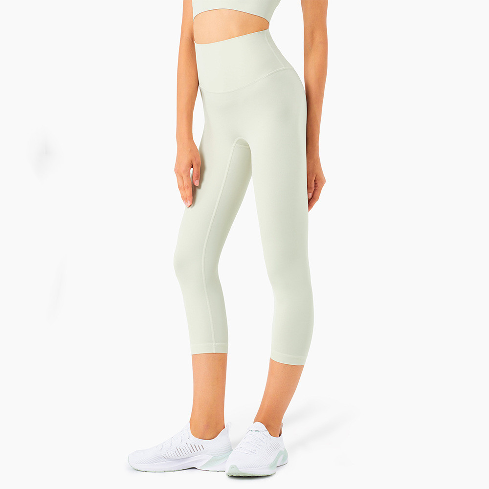 Title 2, High-waisted tight yoga pants with a peach butt...