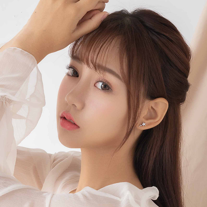 A Pair Of Design Dandelion Ear Studs In Sterling Silver