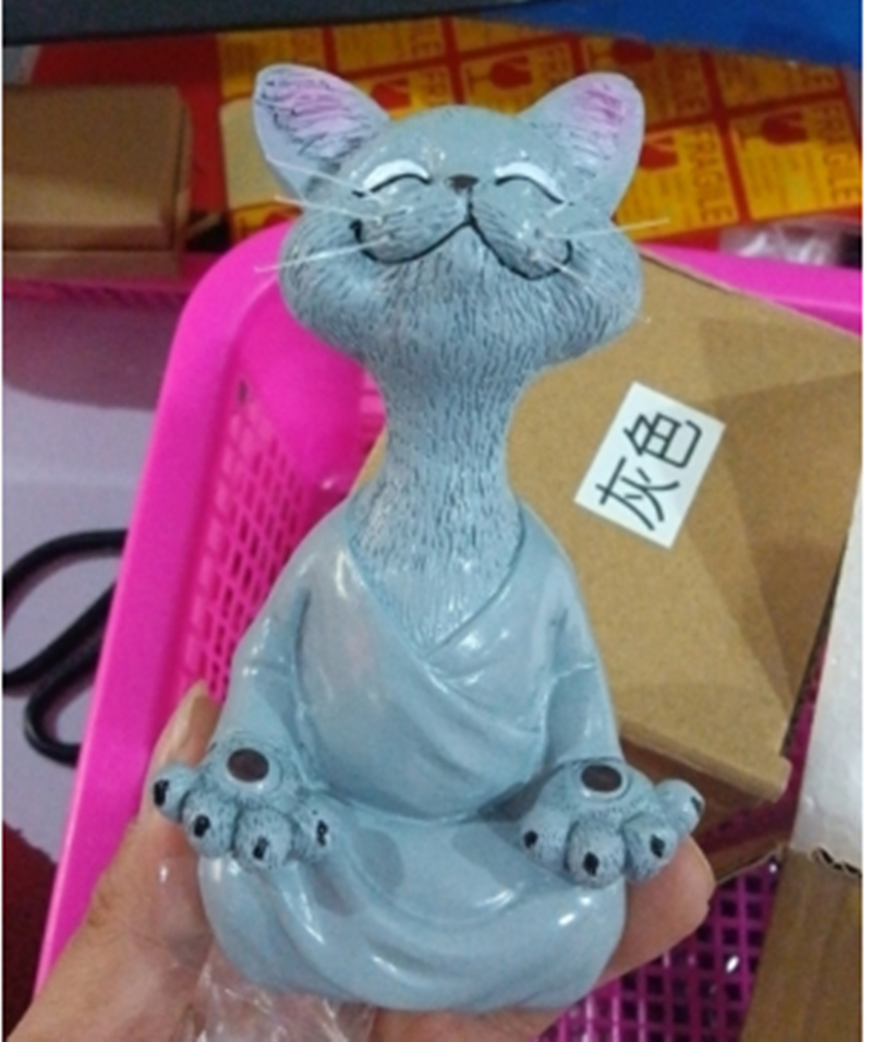 Grey cat sitting12.5cm