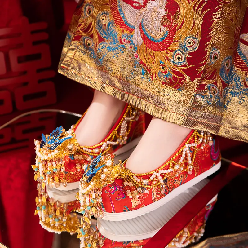 Original Red Xiuhe Wedding Shoes For Women Featuring Ancient Chinese Style. Embroidered Phoenix With Green Enamel On A Clear Fabric. Traditional Chinese Wedding