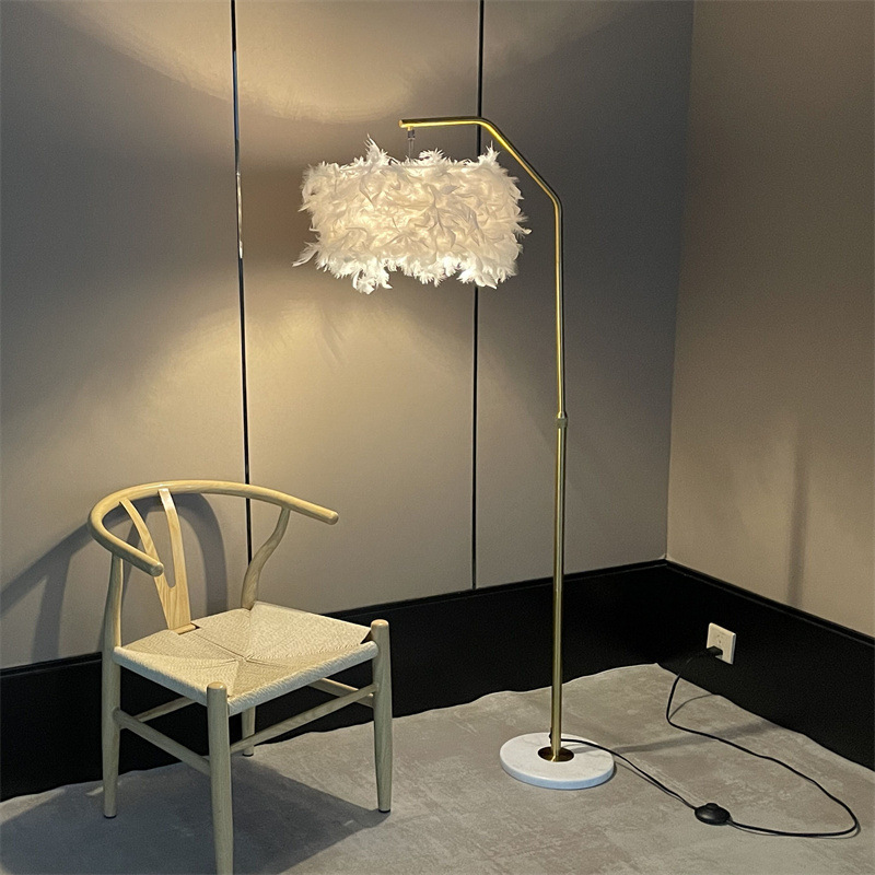 Gold feather floor lamp