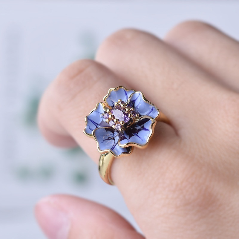 Title 7, 18k Flower Drop Glue Ring. Achieve perfect eyel...