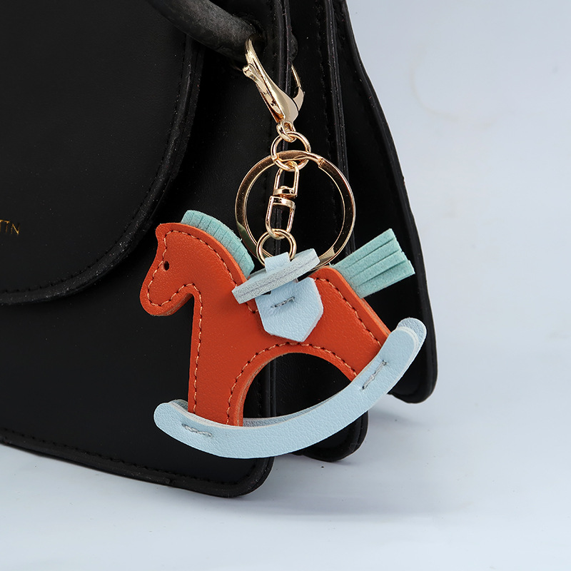 Title 2, Leather Shake Small Wooden Horse Key Chain