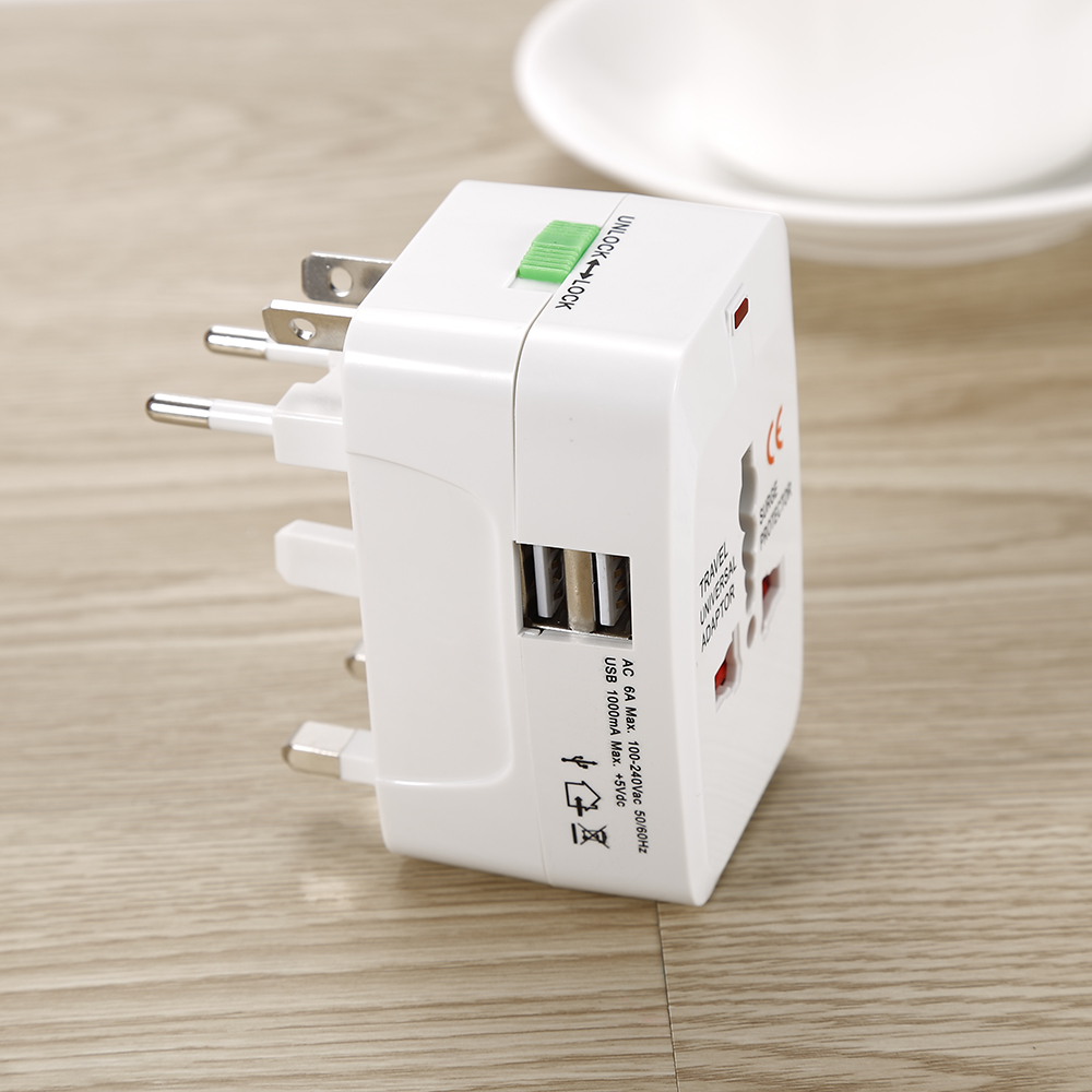 Adaptateur de voyage universel 4-en-1 — Prises US, UK, AU et EU 1
