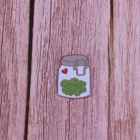 A Hand Drawn Illustration of a Weed Bottle Brooch