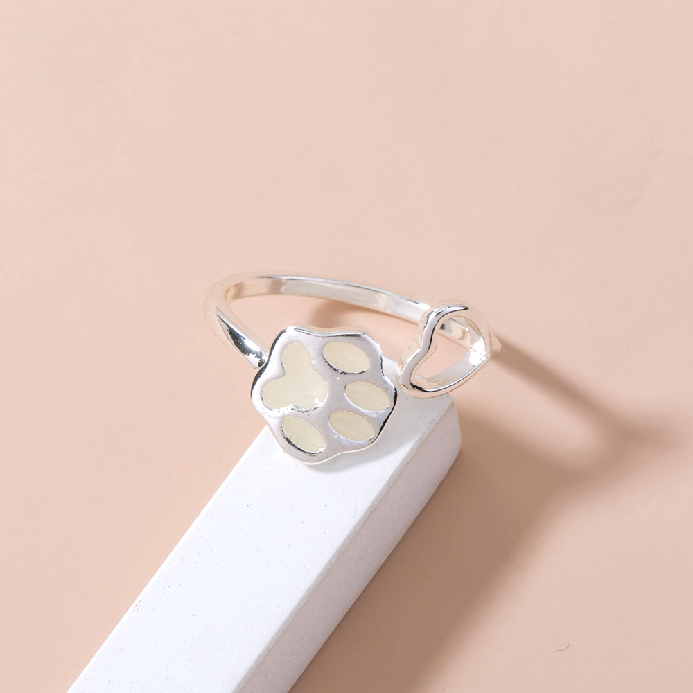 Glow-in-the-dark adjustable ring with dog paws