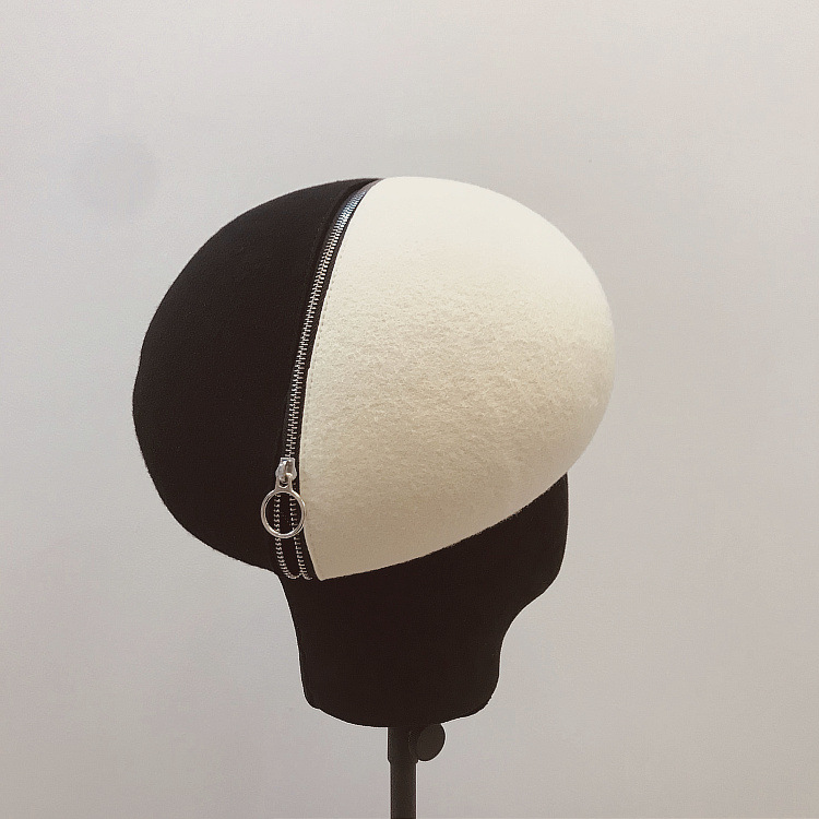 Title 4, Black and white wool felt hat with zipper and b...