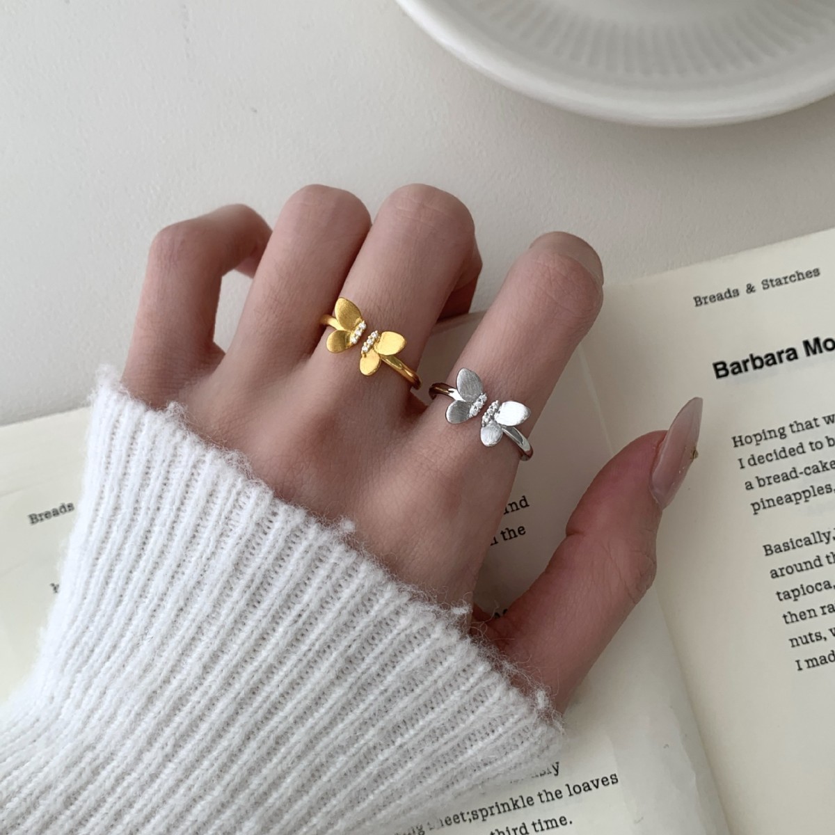 A Sophisticated Butterfly Ring With A Ribbon And Diamond Detailing. thumbnail 1