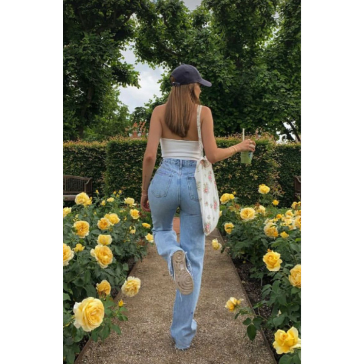 Title 4, High waist wide leg jeans met scheuren en een g...