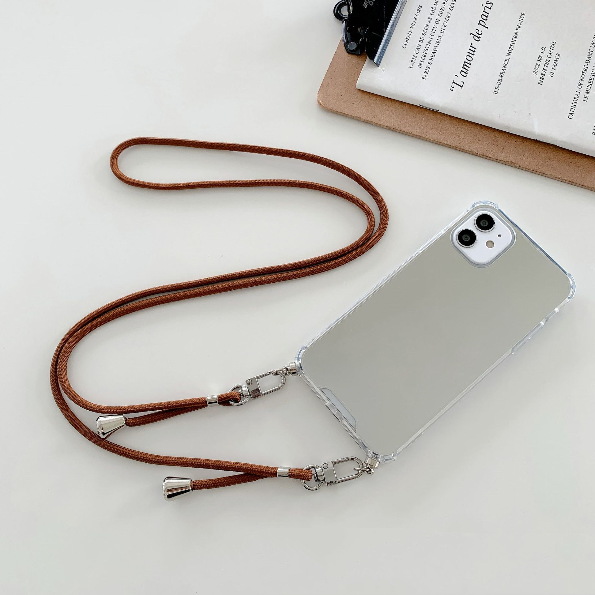 Brown lanyard mirror phone cas