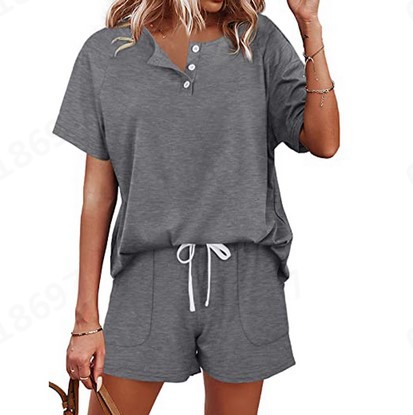 Short sleeve T-shirt and shorts co-ord, model wearing lifestyle photo showing complete matching outfit