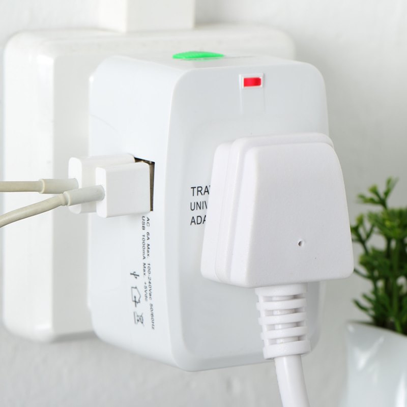 Adaptateur de voyage universel 4-en-1 — Prises US, UK, AU et EU 4