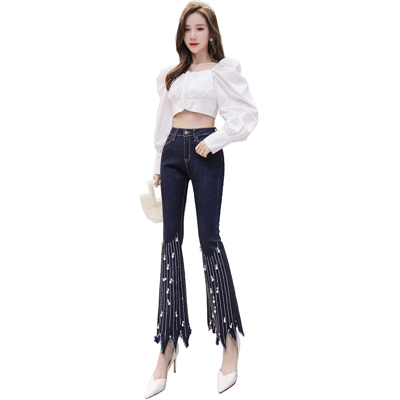 Women's Fashion Tassel Raw Edge Irregular Slit Jeans