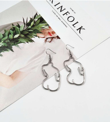 Japan and South Korea fashion simple temperament human body contour earrings retro large variety of personality wild hollow drawing earrings earrings