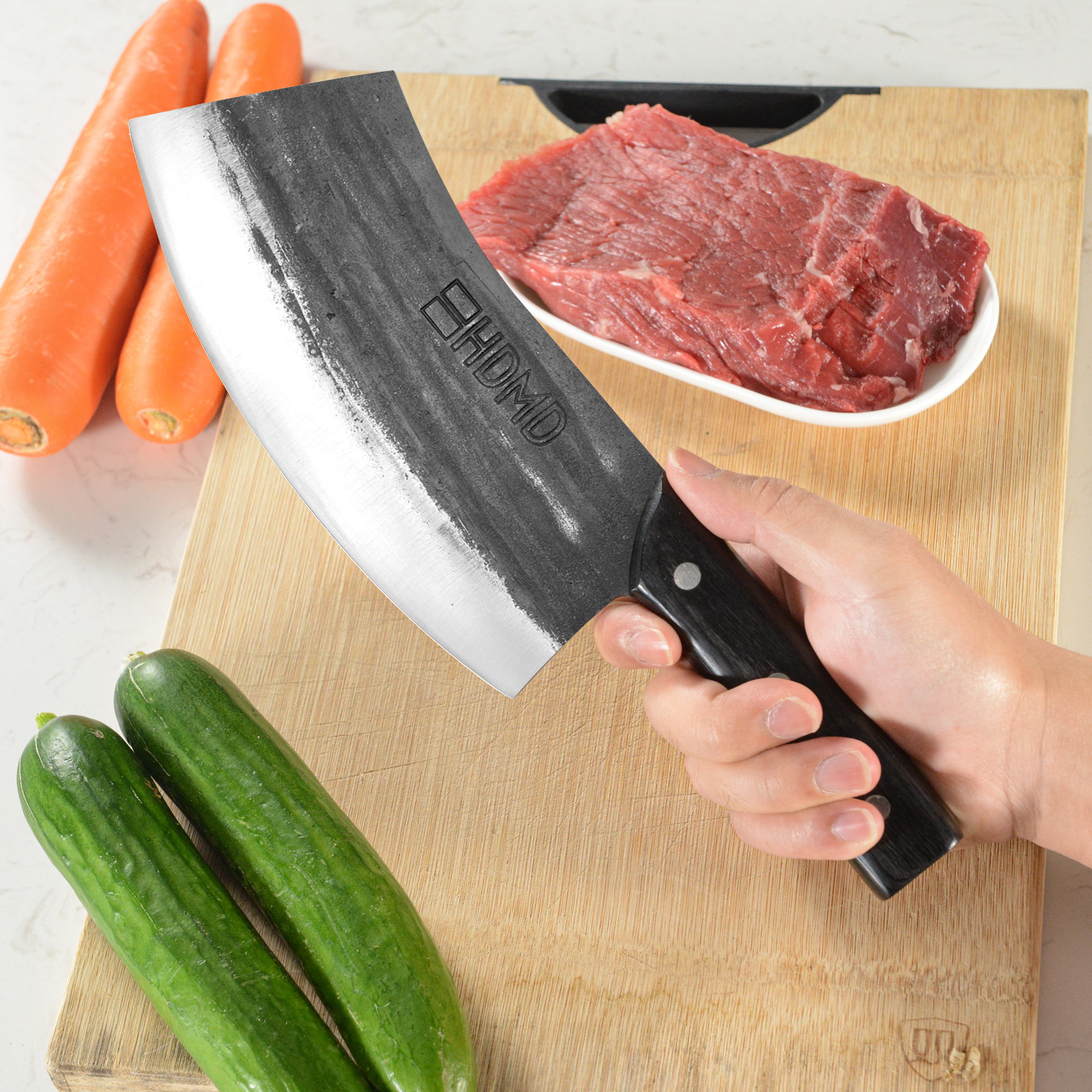 HDMD Meat Cleaver Knife - High Carbon Steel. High Quality Meat Cleaver This kitchen cleaver knife is real hand forged and made of high carbon steel, it's blade uses a V-shaped and fine processing blade, high hardness and wear resistant. Hand polished edge