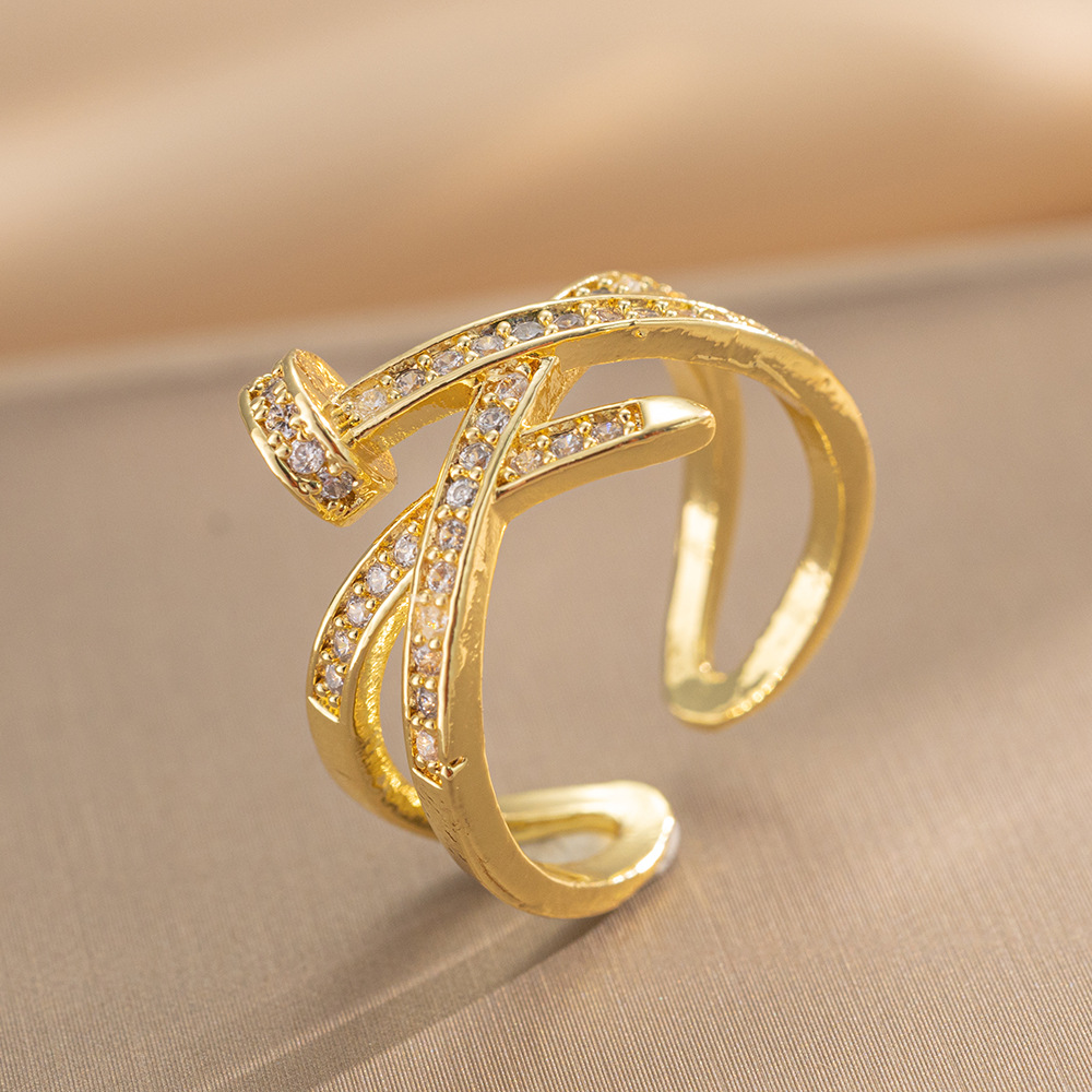 A Diamond Studded Zircon Nail Layered Open Ring
