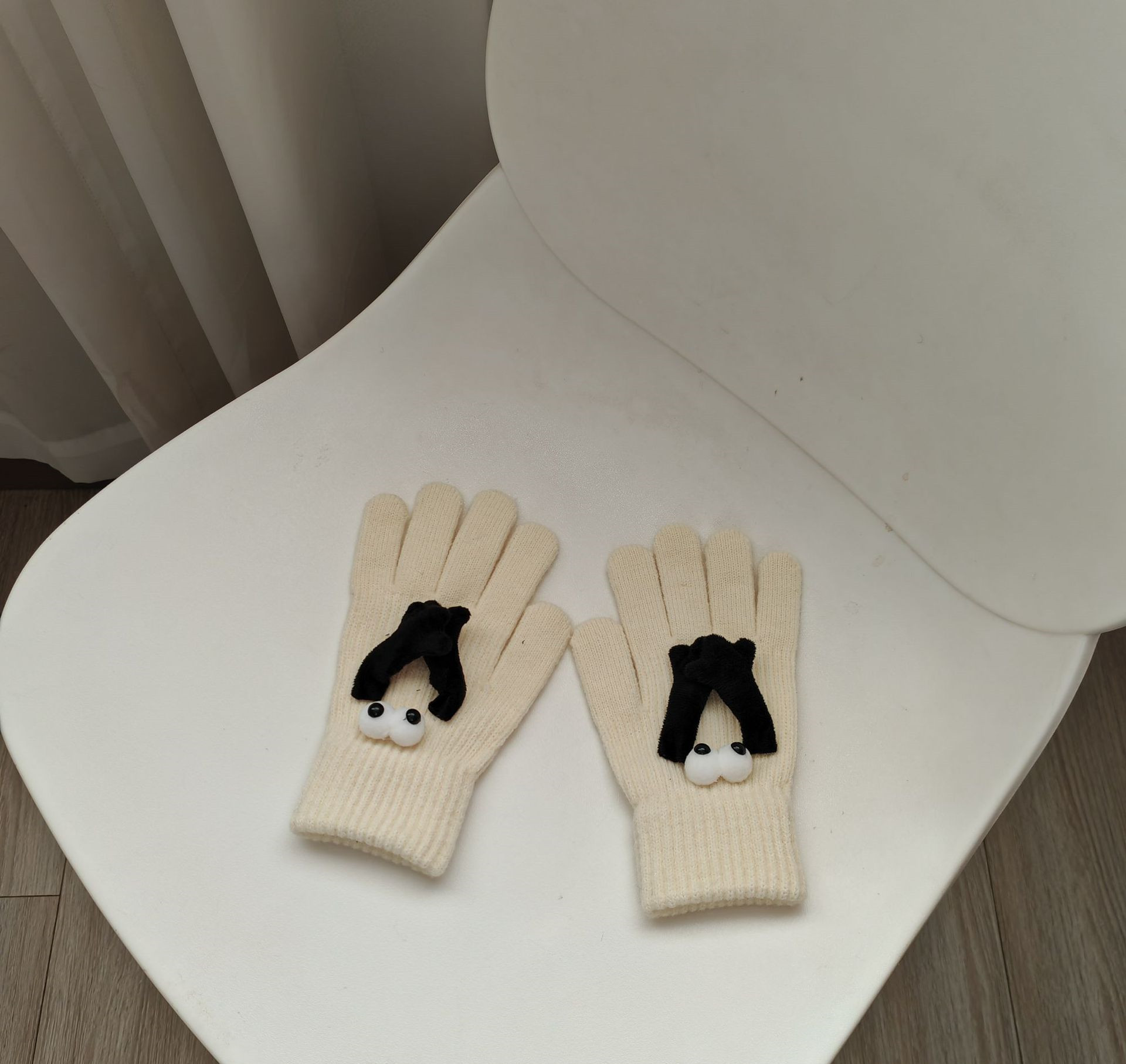 Hand Holding Gloves Beige