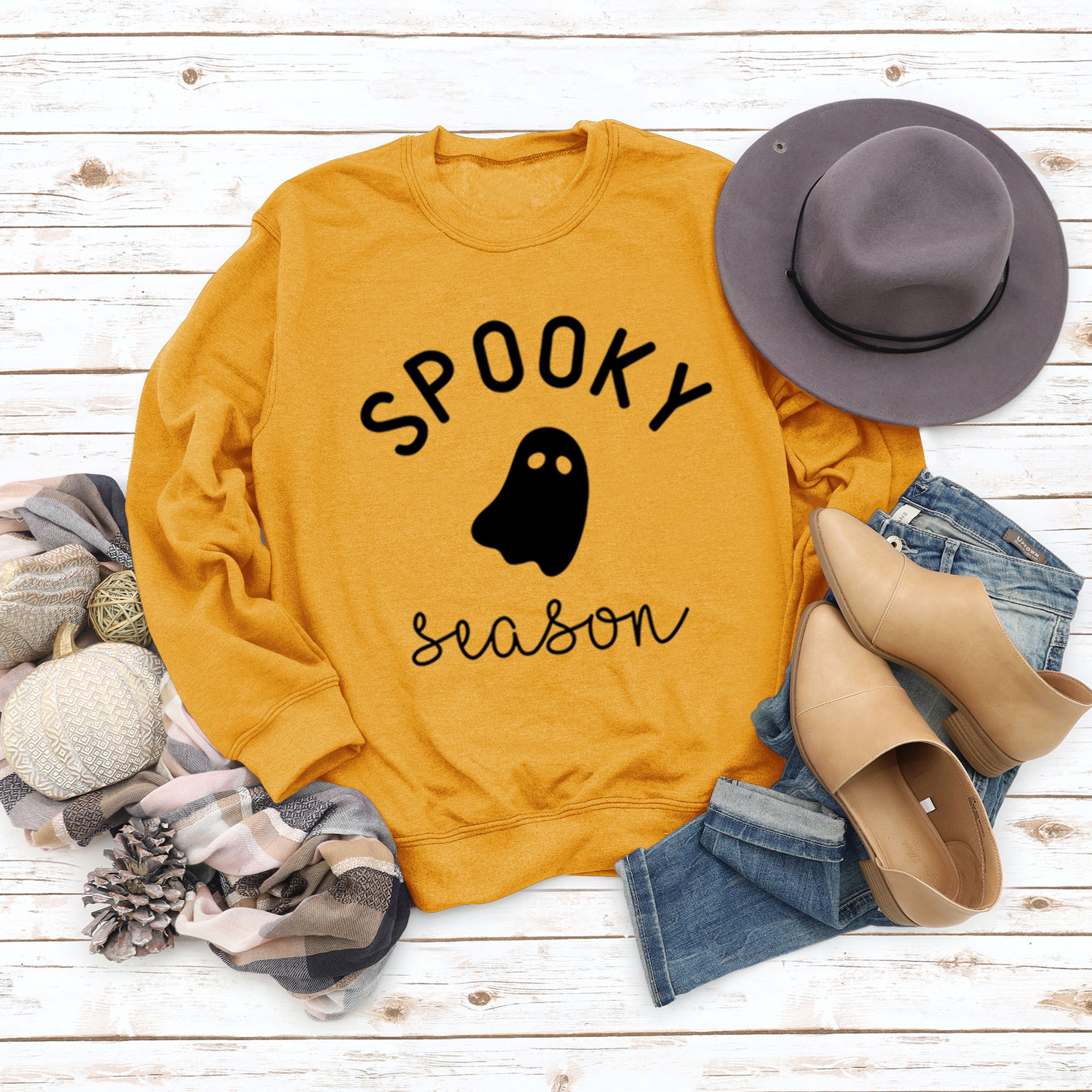 Yellow sweater black font