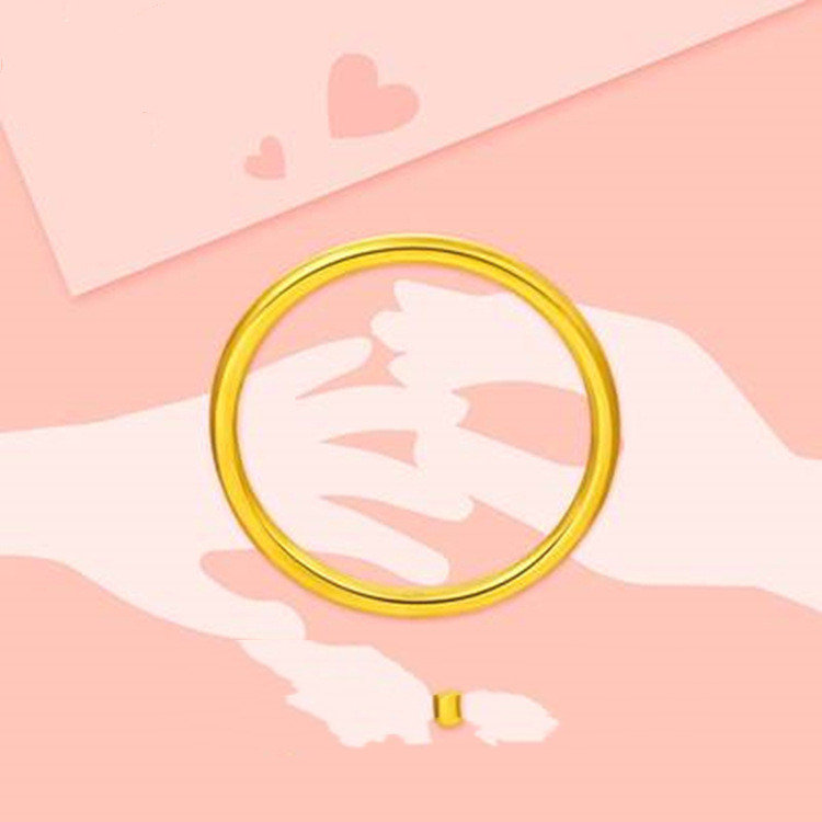 A Gold Ring With A Fine Ring Of Colored Gold